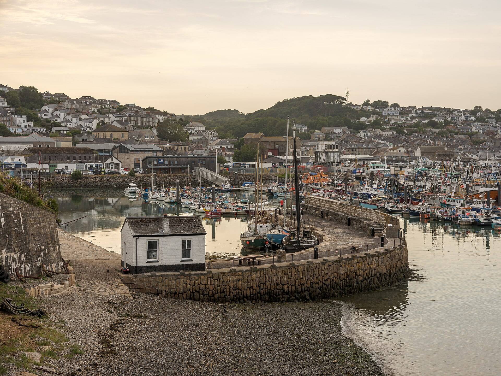 Newlyn's old harbour pier with boats at their moorings