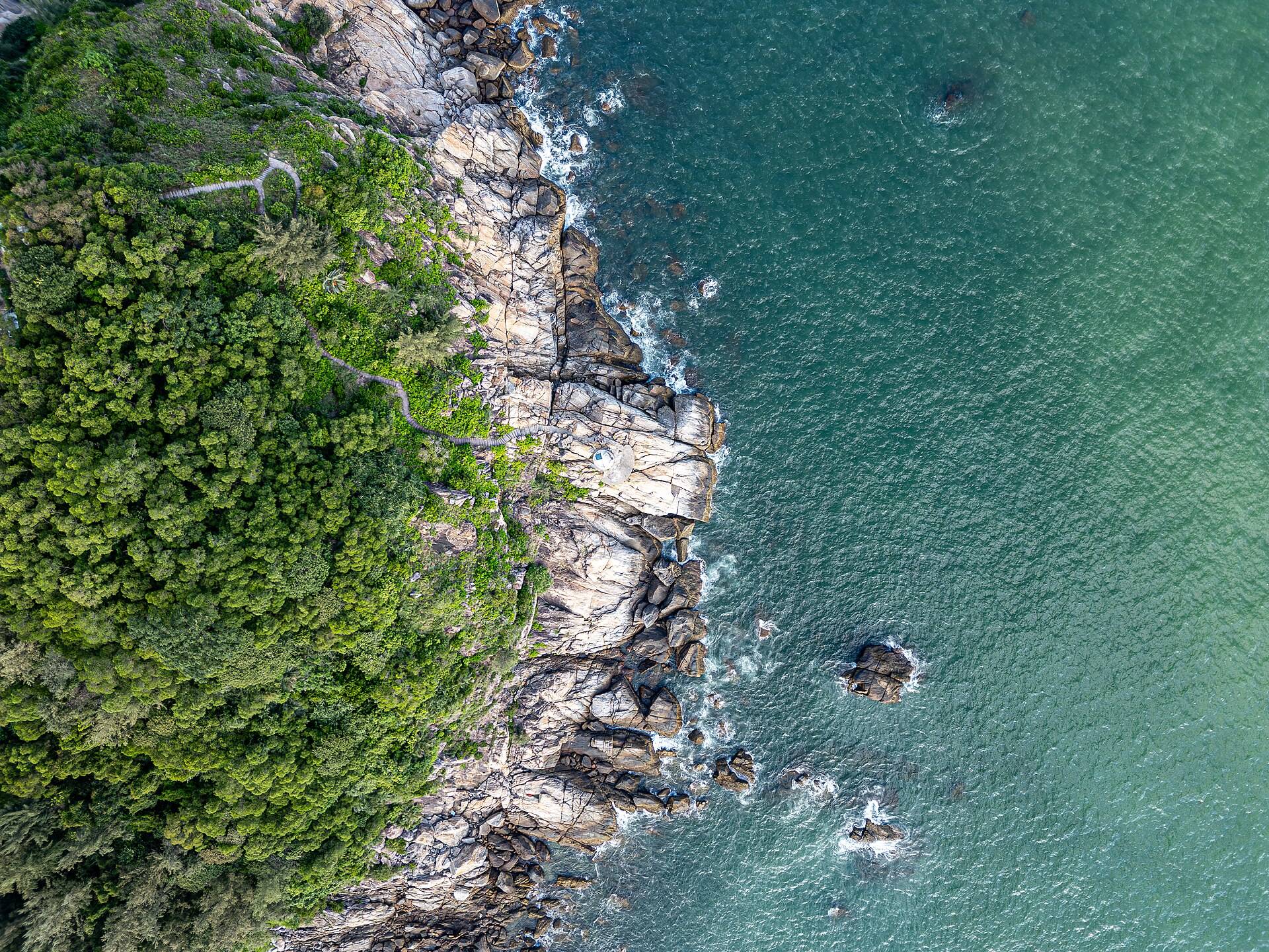 Sample site preview: a rocky coastline from above, the order's area outlined