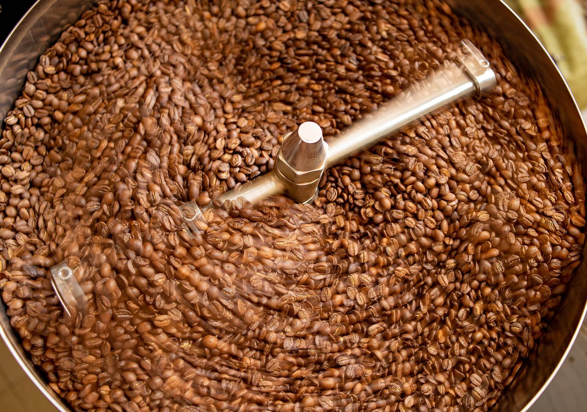 A fresh roast swept round the cooling tray by its paddle arm